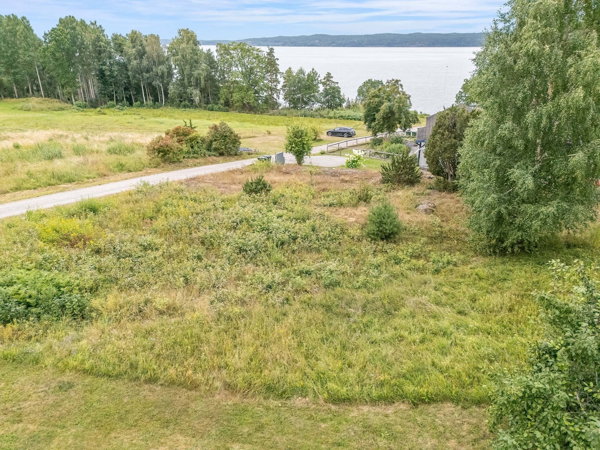 tomt på Glanstrandsvägen 12 Skäftesfall, Finspångs kommun - bild 1