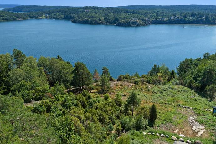 tomt på Tomt med slående havsutsikt i Höggeröd (Slussen) Henån, Orust kommun - bild 1